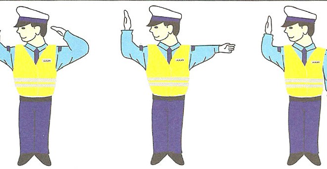 Kierujący ruchem drogowym – policjant